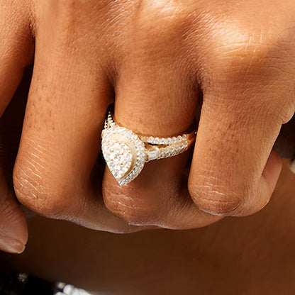 1.0 ct. Gesamtgewicht Halo-Verlobungsring mit Diamanten in Baguette-, rund- und Tropfenschliff in 14K Gelbgold