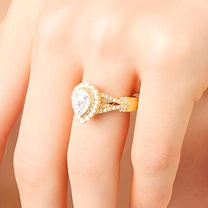 0.63 ct. Gesamtgewicht Verlobungsring mit tropfenförmigem Diamant, Halo und geteiltem Ringschienen-Twist in 10K Gelbgold
