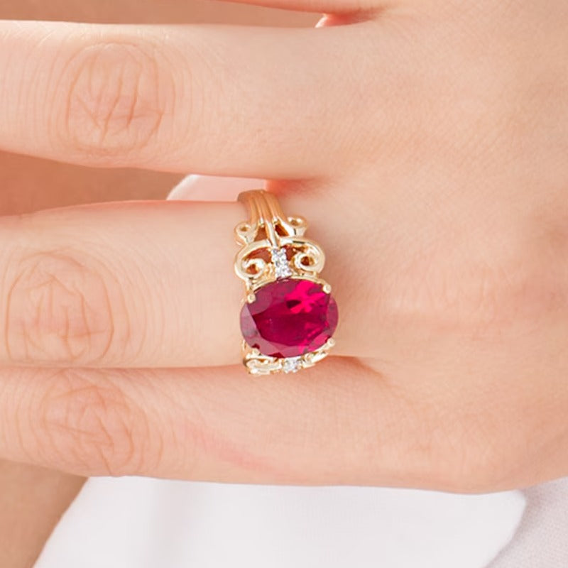 Ovaler im Labor gezüchteter Rubin und 0,05 ct. Gesamtgewicht Diamant Ring im Vintage-Stil mit Schnörkeldesign in 10K Gold