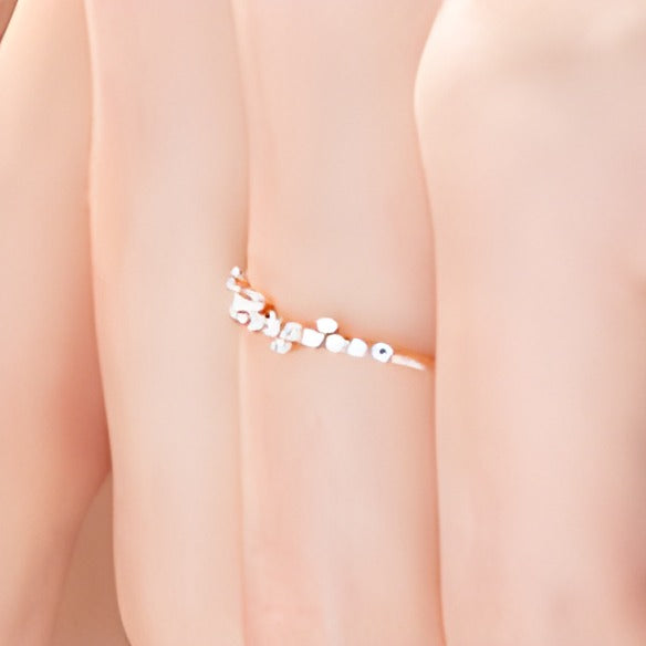 Memoire-Ring mit gestreuten Diamanten 0,25 ct. Gesamtgewicht in 10K Roségold