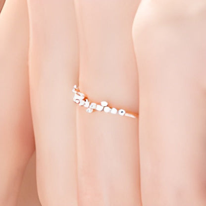 Memoire-Ring mit gestreuten Diamanten 0,25 ct. Gesamtgewicht in 10K Roségold