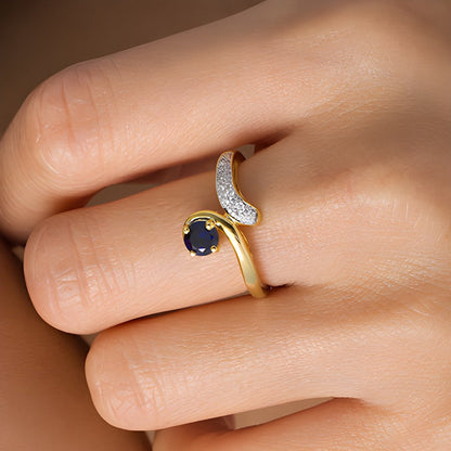 5,0mm im Labor gezüchteter blauer Saphir und Diamant Bypass-Ring, 0,1 ct. Gesamtgewicht, in 14K Weißgold
