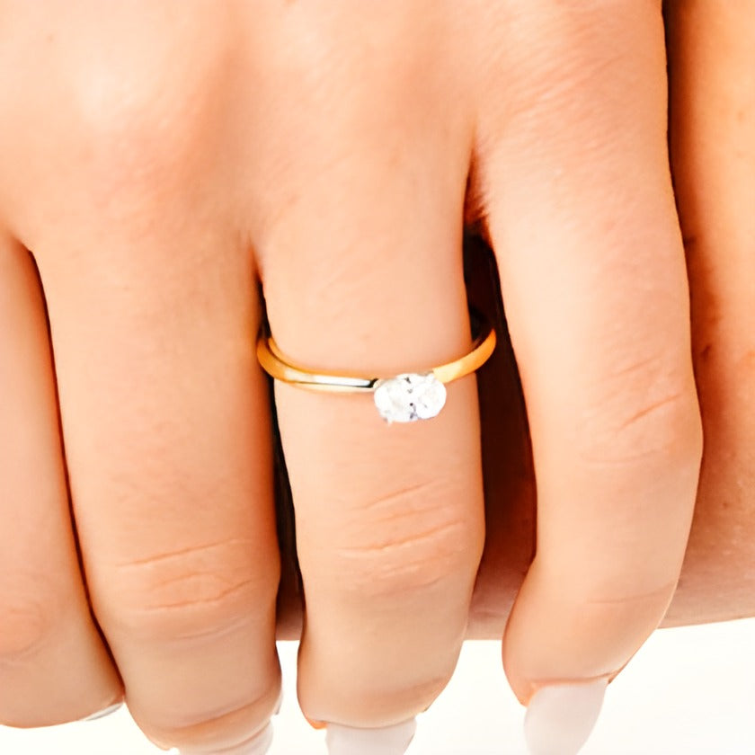 0.5 CT. Solitär-Ring mit ovalem Diamant quer in 14K Bicolor-Gold (I/I2)