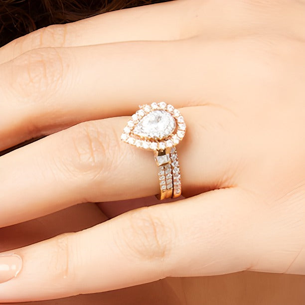 1.0 CT. Gesamtgewicht Braut-Set mit tropfenförmigen Diamanten und doppelter Reihe in 10K Roségold