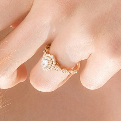 0.38 ct. Gesamtgewicht Verlobungsring mit ovalem Diamant im Art-Déco-Vintage-Stil mit doppeltem Halo in 10K Gelbgold