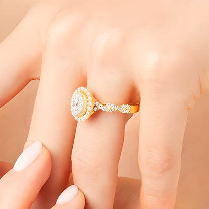 0.63 ct. Gesamtgewicht Verlobungsring mit ovalen Diamanten im Vintage-Stil, Halo-Fassung und gedrehter Ringschiene in 10K Gelbgold