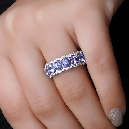 4,0mm Tansanit und weißer synthetischer Zirkon Sieben-Stein-Ring mit Wellenrand aus rhodiniertem Sterlingsilber
