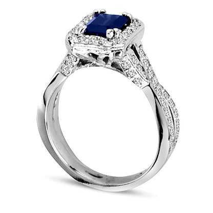 Halo-Ring mit blauem Saphir im Smaragdschliff und Diamanten 0,75 ct. Gesamtgewicht in 14K Weißgold