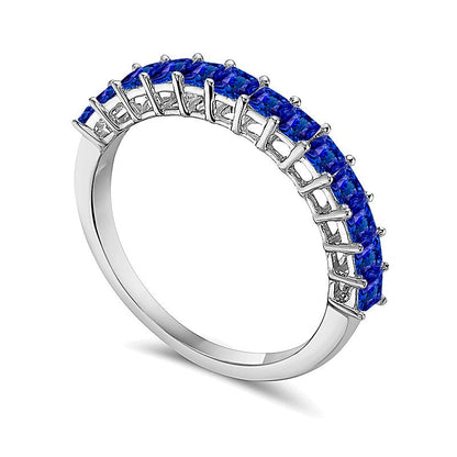 Memoire-Ring mit blauem Saphir im Princess-Schliff in 10K Weißgold