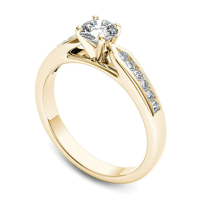 0.63 ct. Gesamtgewicht Diamant-Verlobungsring als Solitär mit seitlichem Besatz in 14K Gelbgold