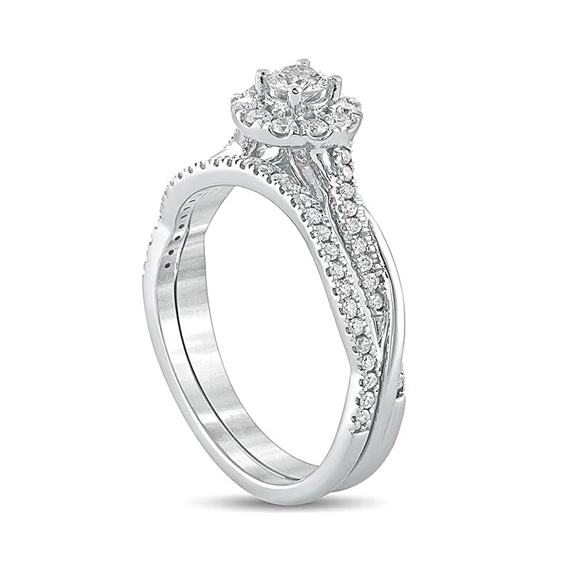 Brautset mit Diamanten 0.5 ct. Gesamtgewicht, rund, Halo mit Twist-Ringschiene, in 10K Weißgold