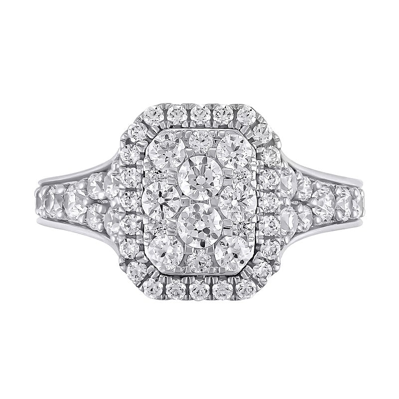 Verlobungsring mit Smaragd und mehreren Diamanten 1.25 ct. Gesamtgewicht in 10K Weißgold