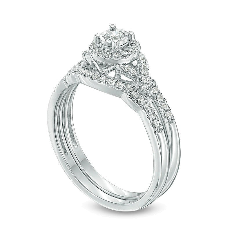 0.33 ct. Gesamtgewicht Diamant Braut-Set mit Halo und gedrehter Schiene in 10K Weißgold