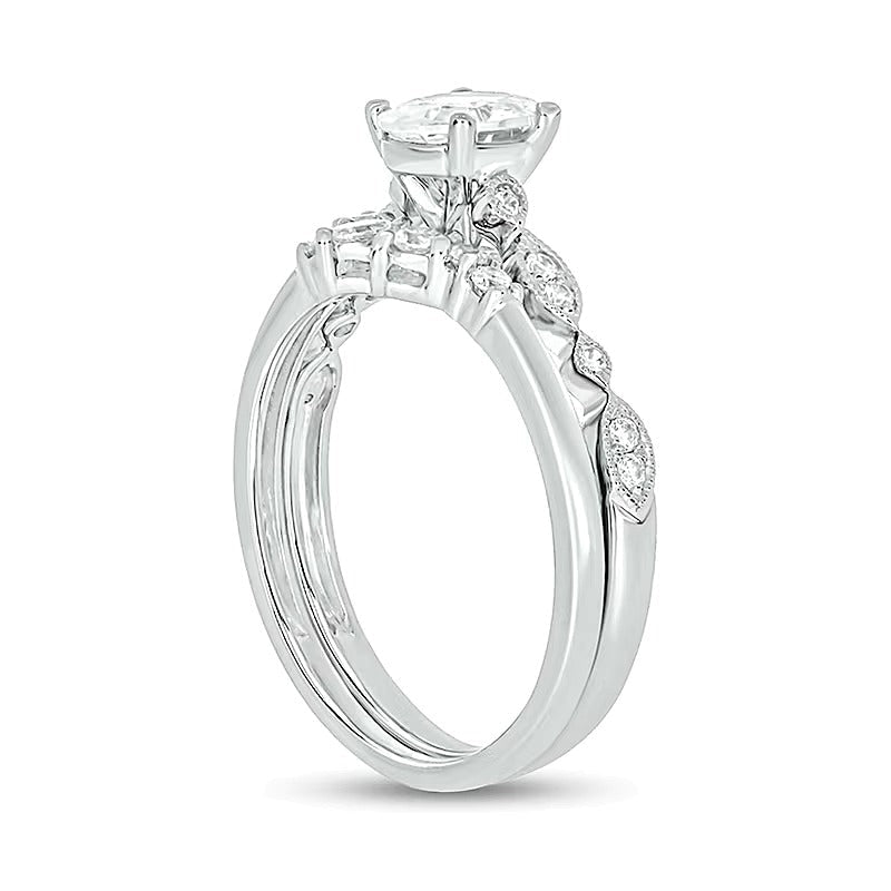 0,75 ct. Gesamtgewicht Brautset mit ovalem Diamant im Vintage-Stil aus 14K Weißgold (I/I2)