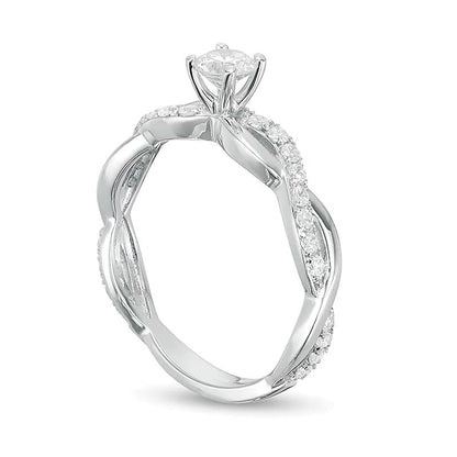 Solitär mit seitlichem Besatz mit Diamanten 1.0 ct. Gesamtgewicht in 14K Weißgold