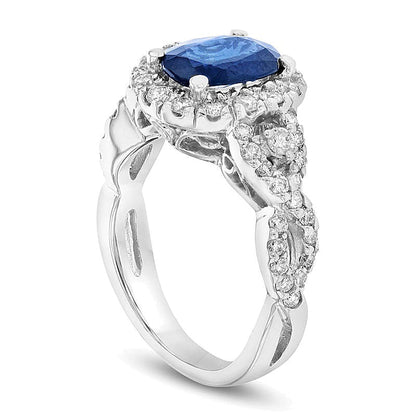 Halo-Ring mit ovalem blauem Saphir und runden Diamanten 0,75 ct. Gesamtgewicht in 14K Weißgold