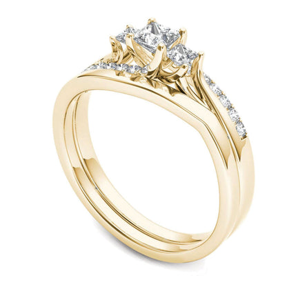 0.5 ct. Gesamtgewicht Diamant im Princess-Schliff Dreistein-Bypass-Brautset in 14K Gelbgold