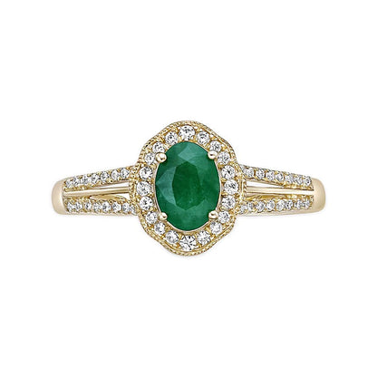 Ring mit ovalem Smaragd und 0,25 ct. Gesamtgewicht Diamanten mit Halo und geteilter Ringschiene in 10K Gelbgold