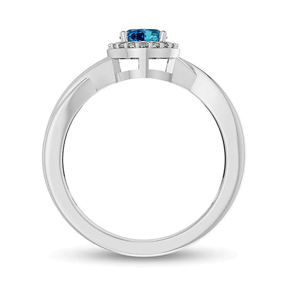 Ring mit ovalem Swiss Blue Topas und 0,07 ct. Gesamtgewicht Diamanten mit Rahmen und Crossover-Schiene in 10K Weißgold