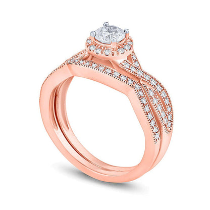 Braut-Set mit Diamanten 0.75 CT. Gesamtgewicht, rund, gedrehte Schiene, in 14K Roségold