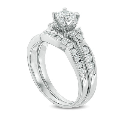 Brautset mit Diamanten 1.0 ct. Gesamtgewicht, rund, dreiseitig, in 10K Weißgold