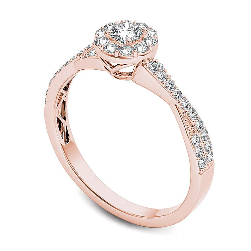 0.5 ct. Gesamtgewicht Diamant Halo Verlobungsring mit gedrehter Schiene in 14K Roségold