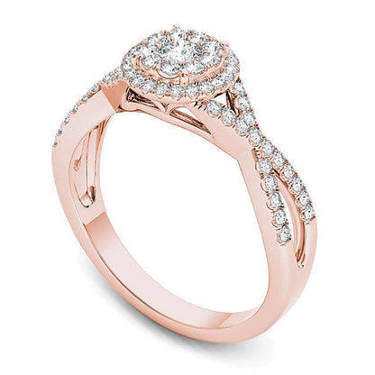 0.5 ct. Gesamtgewicht Diamant-Verlobungsring Halo mit gedrehter Ringschiene in 14K Roségold