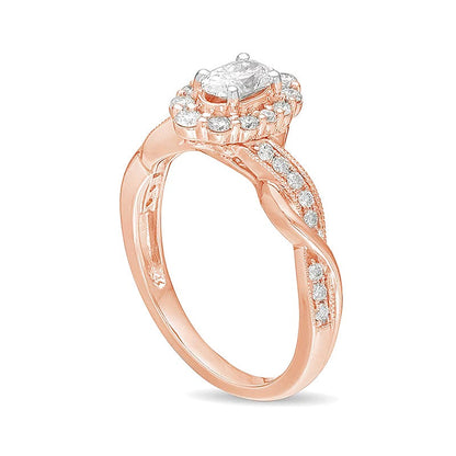 0,75 ct. Gesamtgewicht Verlobungsring im Vintage-Stil mit ovalem Diamanten, Halo und gedrehter Ringschiene in 10K Roségold