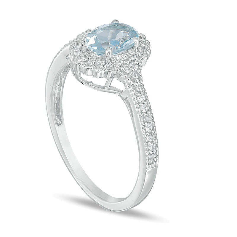 Halo-Ring mit ovalem Aquamarin und Diamanten 0,13 ct. Gesamtgewicht im Vintage-Stil in 10K Weißgold
