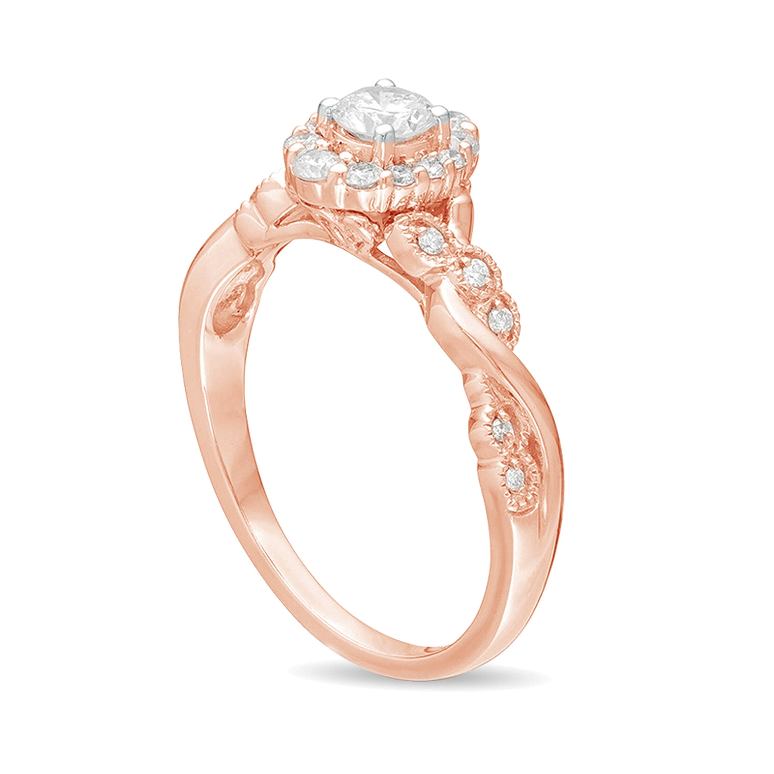 Verlobungsring mit Halo im Vintage-Stil und gedrehter Ringschiene, 0.5 CT. Gesamtgewicht Diamant in 10K Roségold