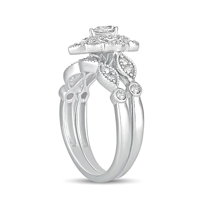 0,63 ct. Gesamtgewicht Diamant-Brautset im Vintage-Stil mit tropfenförmigen und runden Diamanten, doppeltem Blütenrahmen in 10K Weißgold