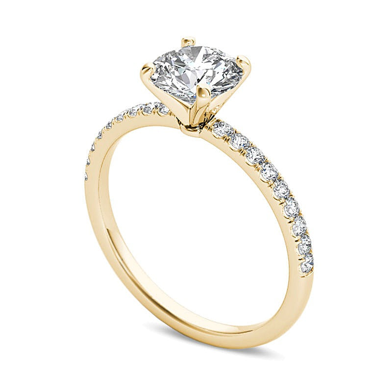 Solitär mit seitlichem Besatz mit Diamanten 1.0 CT. Gesamtgewicht in 14K Gelbgold