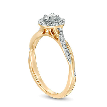 0.38 ct. Gesamtgewicht Verlobungsring mit ovalem Diamanten und Halo aus 10K Gelbgold