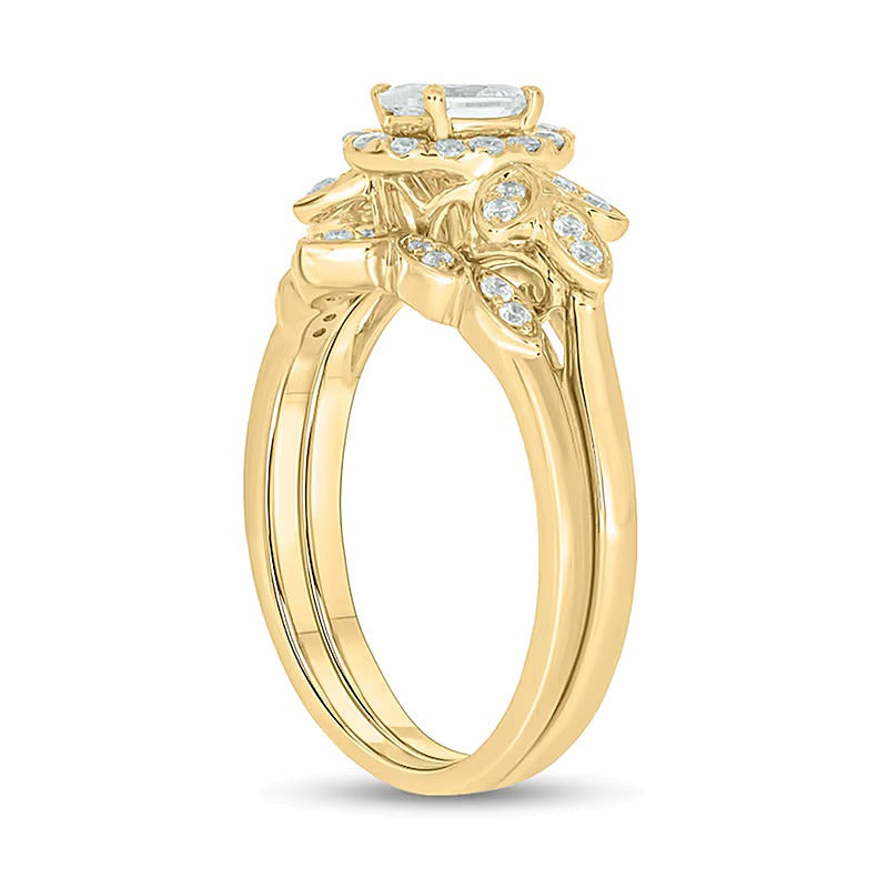 0,75 ct. Gesamtgewicht Brautset mit ovalem Diamant, Halo und blattförmigem seitlichem Besatz in 14K Gelbgold (I/I2)