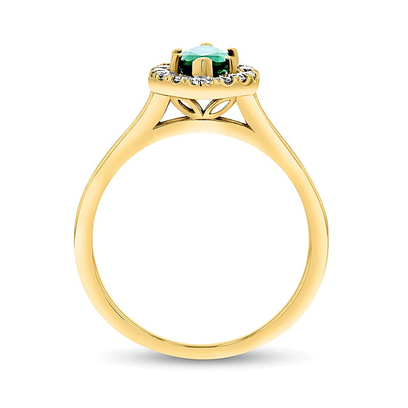 Ring mit Smaragd im Marquise-Schliff und Diamanten 0,25 ct. Gesamtgewicht als Halo in 14K Gelbgold