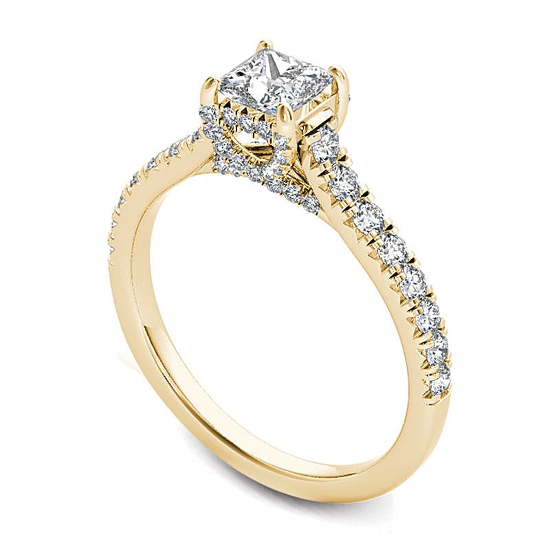 0.75 ct. Gesamtgewicht Solitär mit seitlichem Besatz mit Diamanten im Princess- und Rundschliff in 14K Gelbgold