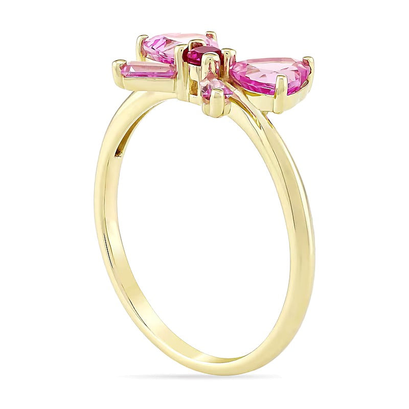 Fashion-Ring in Schleifenform mit Rubin und Saphir in Herz-, Baguette- und Rundschliff aus 10K Gelbgold