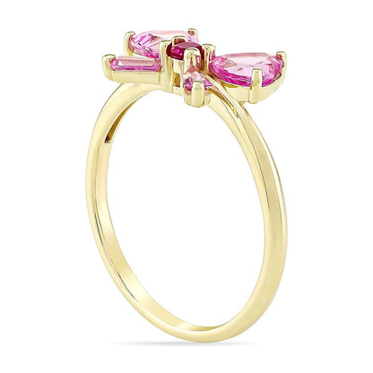 Fashion-Ring in Schleifenform mit Rubin und Saphir in Herz-, Baguette- und Rundschliff aus 10K Gelbgold