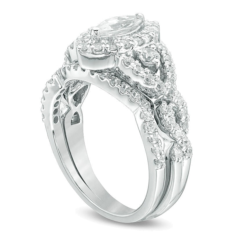 1.5 CT. Gesamtgewicht Marquise Diamant Brautset mit gedrehtem Rahmen in 10K Weißgold