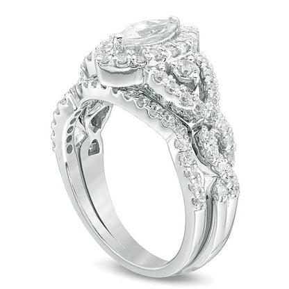 1.5 CT. Gesamtgewicht Marquise Diamant Brautset mit gedrehtem Rahmen in 10K Weißgold