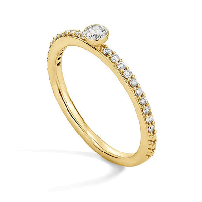 Memoire-Ring mit Diamanten 0,25 ct. Gesamtgewicht in Zargenfassung, stapelbar, aus 10K Gelbgold