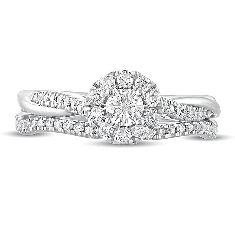 Brautset mit Diamanten 0.5 ct. Gesamtgewicht, rund, Halo mit Twist-Ringschiene, in 10K Weißgold
