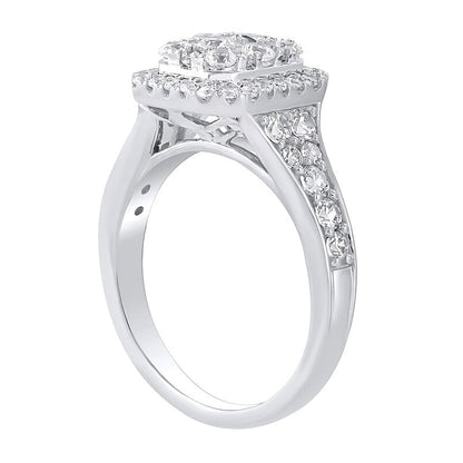 Verlobungsring mit Smaragd und mehreren Diamanten 1.25 ct. Gesamtgewicht in 10K Weißgold