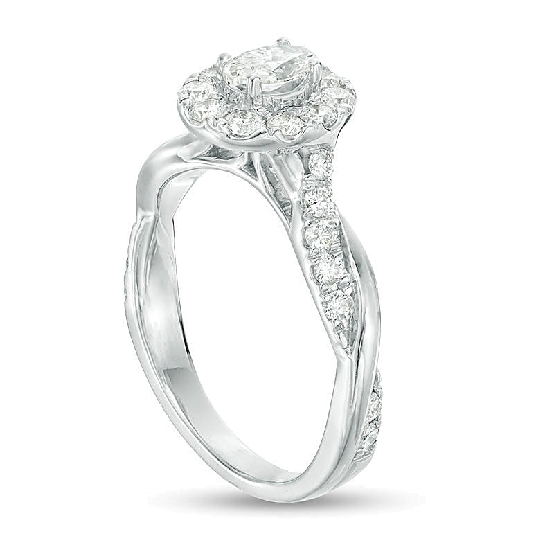 0,88 ct. Gesamtgewicht Verlobungsring mit ovalem Diamant und Halo mit gedrehter Ringschiene in 10K Weißgold
