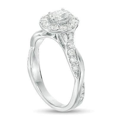 0,88 ct. Gesamtgewicht Verlobungsring mit ovalem Diamant und Halo mit gedrehter Ringschiene in 10K Weißgold