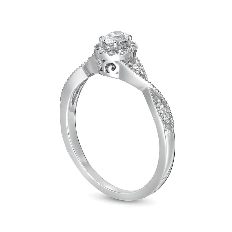 0.33 ct. Gesamtgewicht Verlobungsring mit Halo, ovalem Diamant und gedrehter Ringschiene in 14K Weißgold (I/SI2)