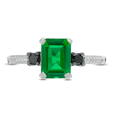 Dreistein-Ring mit Smaragd im Smaragdschliff (Labor) und schwarzen sowie weißen Diamanten 0,13 ct. Gesamtgewicht in 10K Weißgold