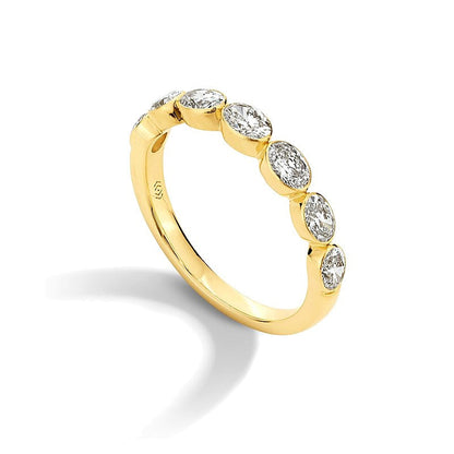 1.0 ct. Gesamtgewicht Memoire-Ring mit sieben ovalen Labordiamanten in Zargenfassung aus 14K Gelbgold (F/VS2)