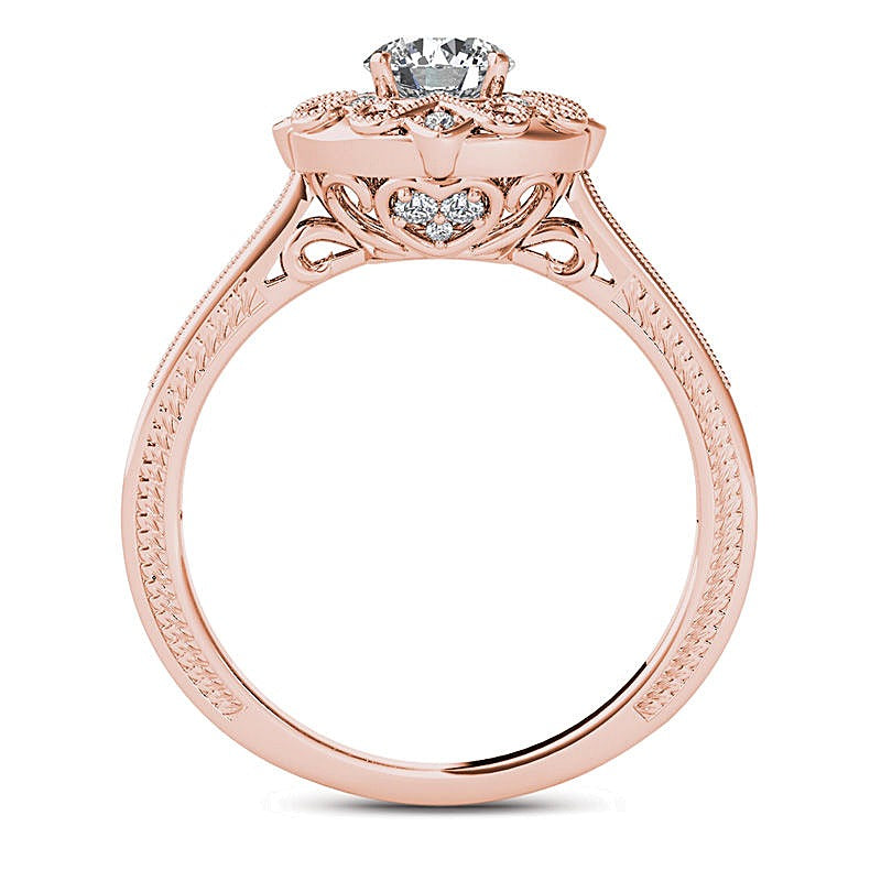 0.63 ct. Gesamtgewicht Diamant Verlobungsring im Vintage-Stil mit Blütenrahmen in 14K Roségold