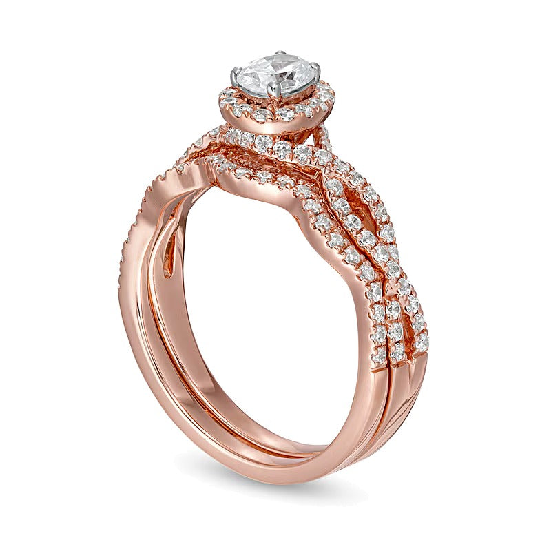 Braut-Set mit ovalem Diamant 1.0 CT. Gesamtgewicht in 14K Roségold (I/I2)